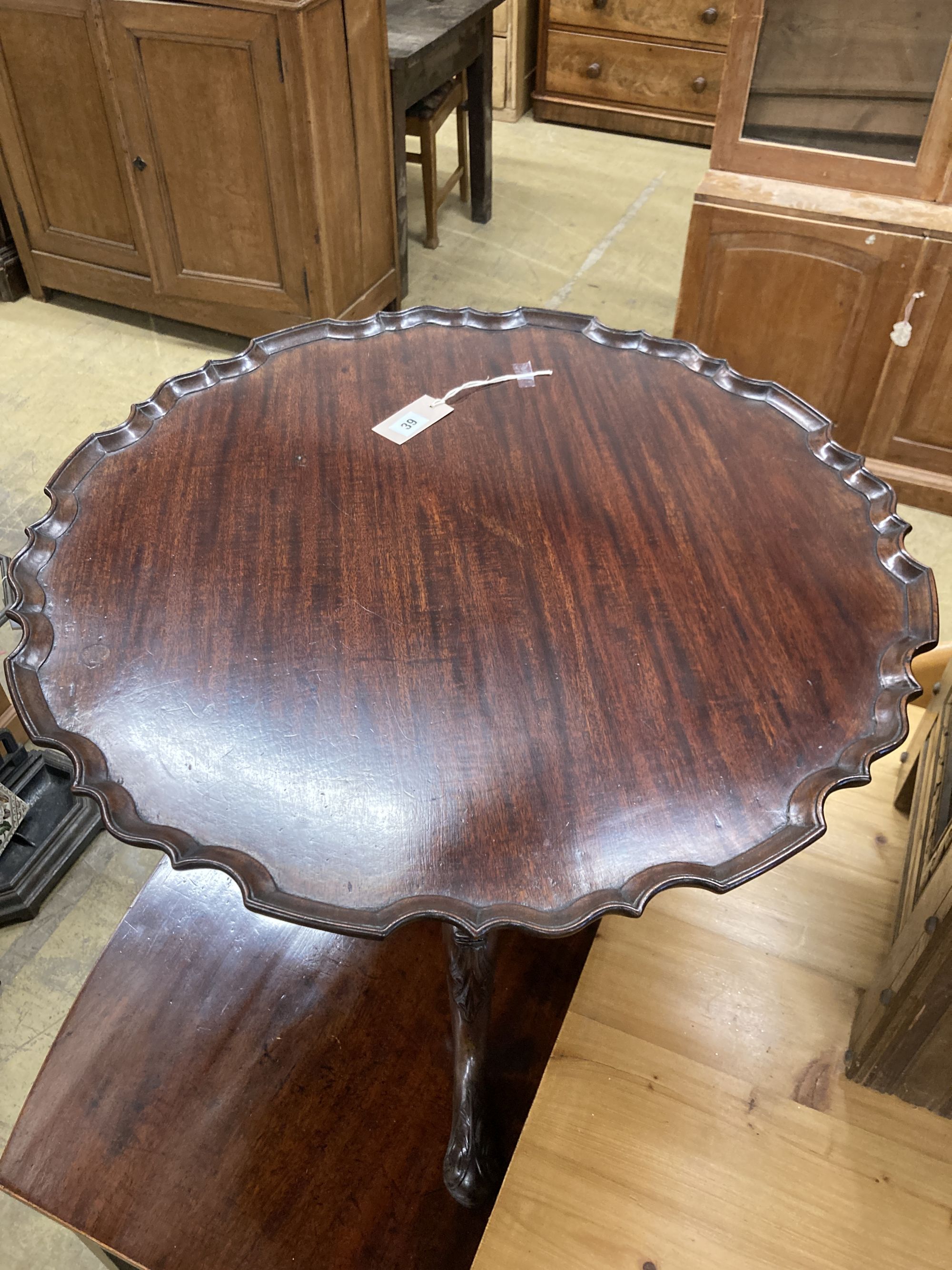 A Chippendale style mahogany circular pie-crust coffee table (cut down) 70cm diameter, height 51cm